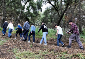 Joan's family celebrates by hiking a trail on the Ranch