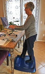 Joyce at standing workstation