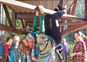 Amber hanging from bridge girder