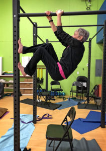 Joan climbing hanging cage