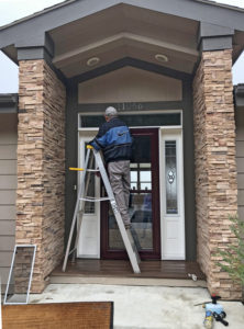 Willis on ladder washing transom