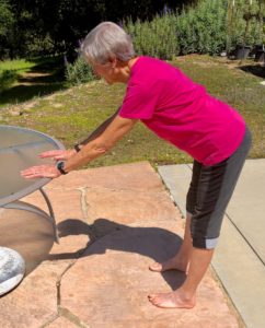 Joan doing Forward Bend Hamstring Stretch