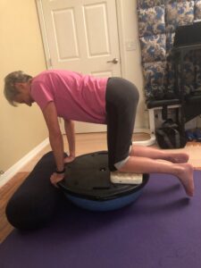 Joan on BOSU inverted