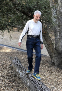 Willis at 82 balance training by walking a log