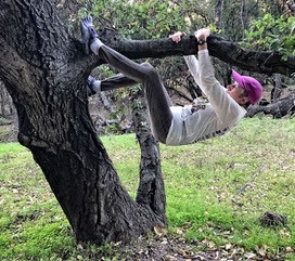 Joan climbing tree